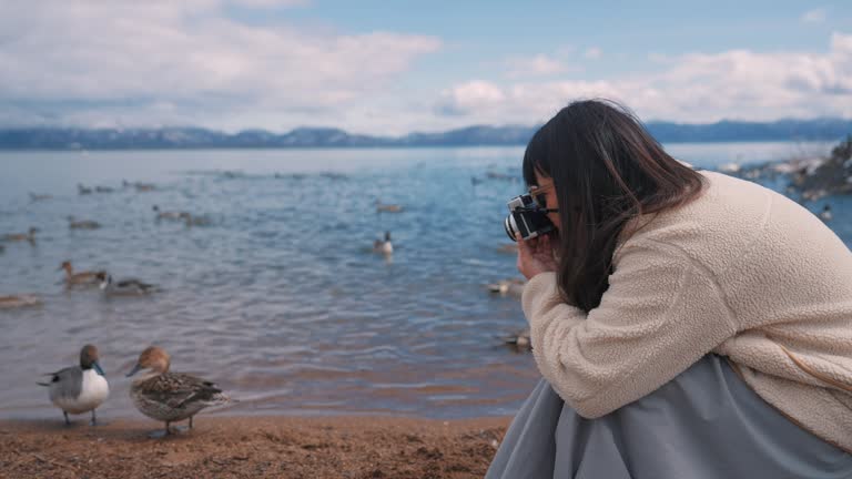 Tourist women take photo at Inawashiro lake