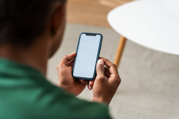 istock Person holding smartphone with blank screen 2147697799