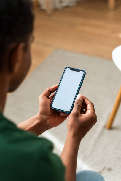 istock Person holding smartphone with blank screen 2147697810