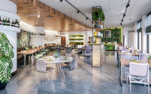 istock A side view of a large modern restaurant / bar with tables and chairs, stools, benches, breakfast cupboard and large windows with cityscape view in the background 2147697831