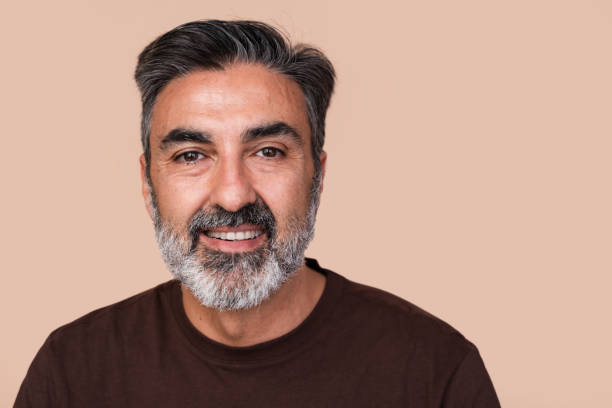 istock Cheerful mature man with gray beard smiling 2147698915
