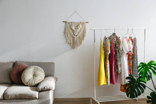 istock Female clothing on hangers inside the interior. 2147702832