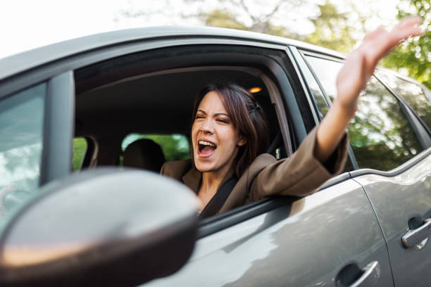istock Frustrated Woman Navigating Traffic on Route to Work 2147703099
