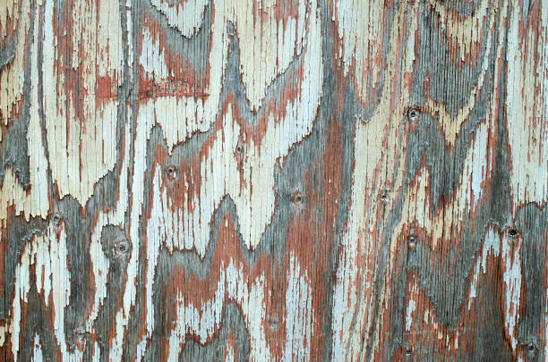 Old multicolored painted wooden surface close up