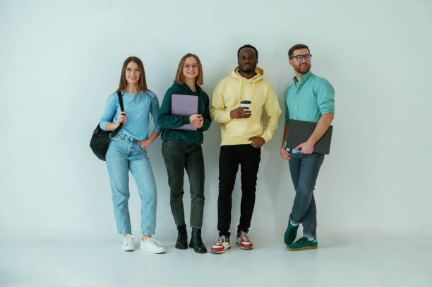 istock Against white background. Group of friends are in the studio 2147705365