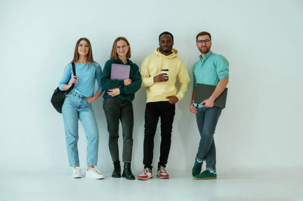 istock Against white background. Group of friends are in the studio 2147705383
