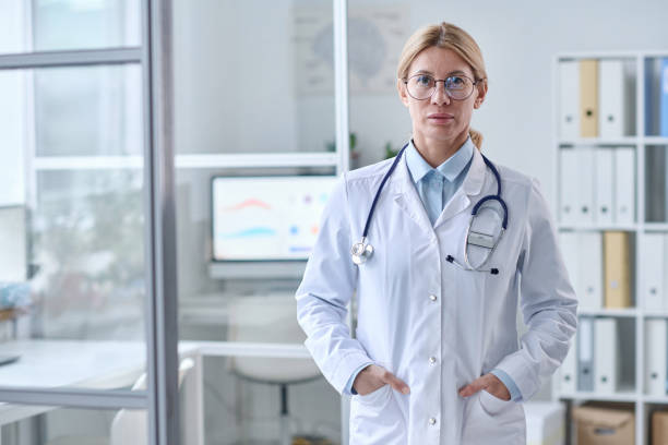 istock Expert Female Doctor Looking at Camera 2147705635