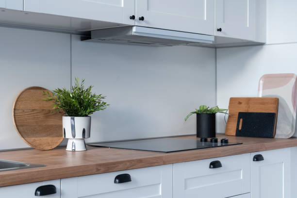 istock Kitchen worktop and electric hob in design interior at new home. 2147705723
