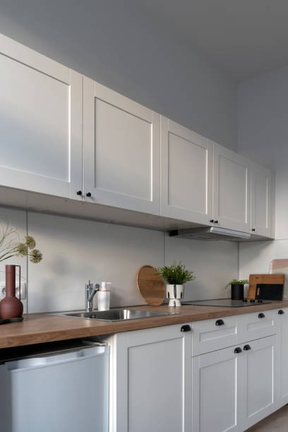 istock Kitchen worktop and electric hob in design interior at new home. 2147705724