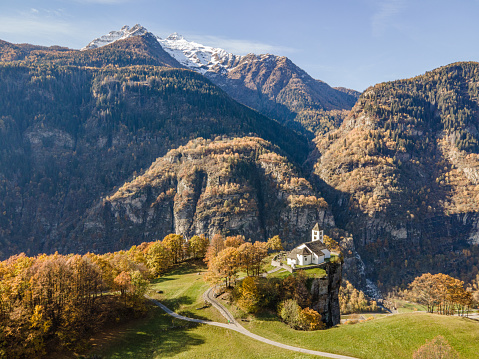 Aerial view of Levetina in autumn, in mountain landscape, Ticino
