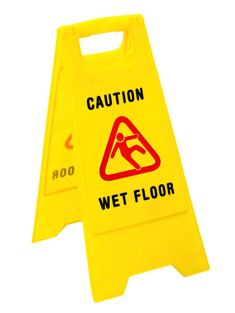 istock Caution Wet Floor yellow warning sign isolated on white 2147706655