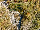 Aerial view of fortified bridge and waterfall