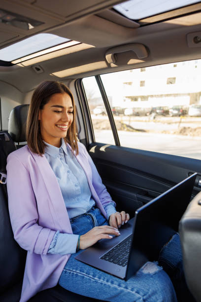 istock Preparing for the meeting in taxi 2147706798