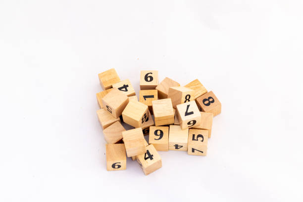 Wooden cubes with numbers isolated on white background. Counting number concepts.