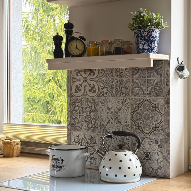 istock Home interior of kitchen with window, pattern tile and kettle on the hob. 2147708138