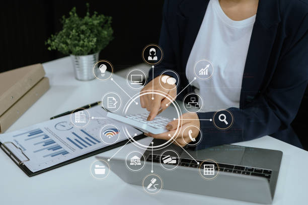 istock Women are using calculators to calculate office income. 2147709941