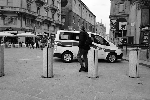 Milan, Italy - April 09, 2024: people walking in  the center of Milan in Duomo Square
