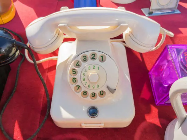 Vintage White Rotary Dial Telephone at Flea Market