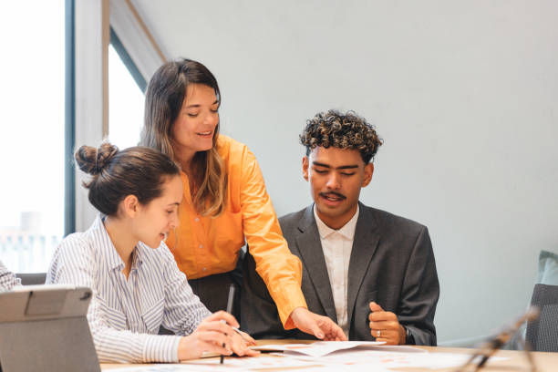istock young people in meeting in office 2147714911