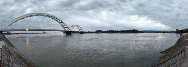 istock panoramic view of the bridge over Danube river in Novi sad, reflected in the water surface 2147716591