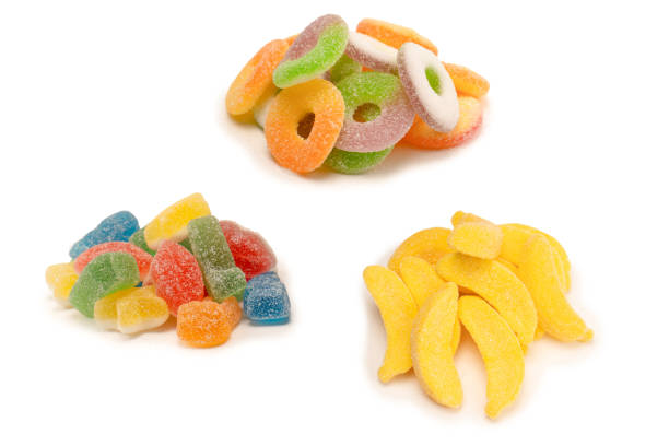 Assorted gummy candies isolated on a white background. Top view. Jelly  sweets.