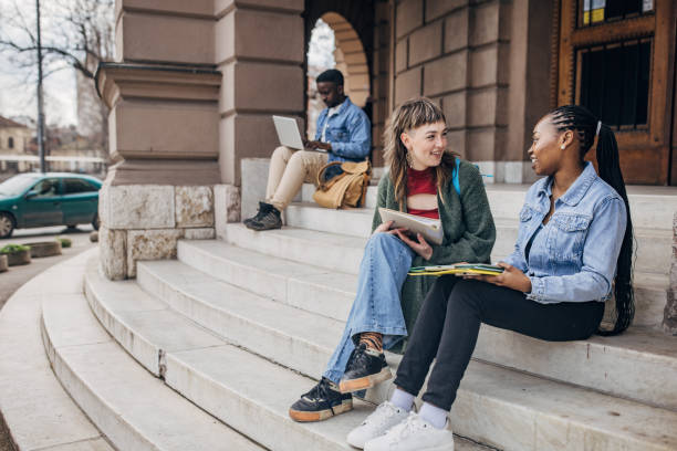 istock College friends studying on campus steps 2147721278