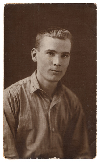 Vintage photo of a young man of twenty years old. Photo from 1929. USSR, Rostov.