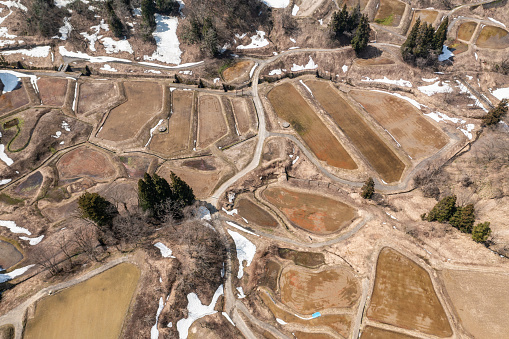 Drone photo: Rice terraces with melting snow