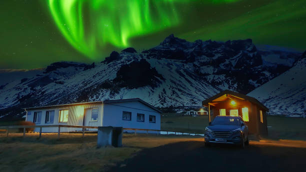 istock Aurora Northern lights over snowy mountains 2147725337