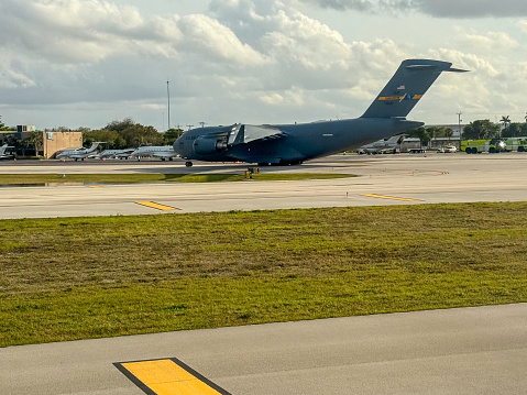 Fort Lauderdale, Florida - March 23, 2024: Support aircraft for Air Force 2, the aircraft for the Vice President on the tarmac of the airport in Fort Lauderdale, Florida