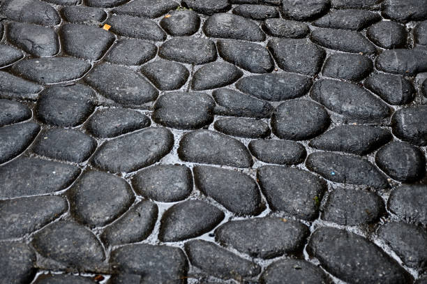 istock Cobble stone street background 2147943154