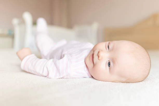 istock A small baby in a good mood. 2148023297