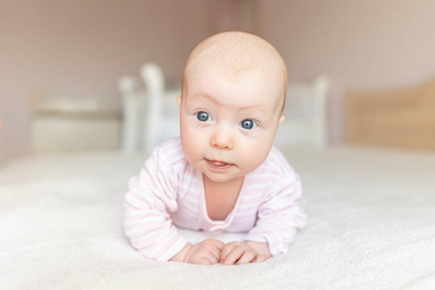 istock A small baby in a good mood. 2148023298