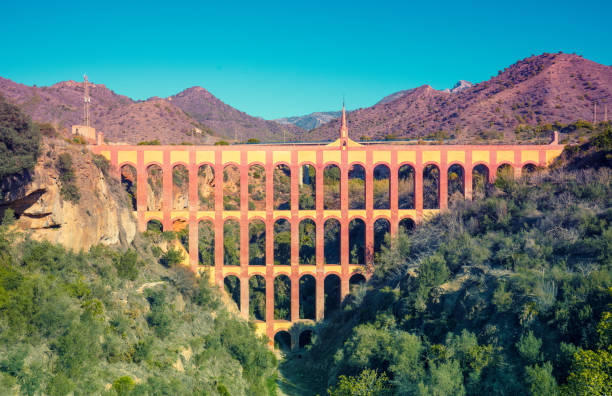 View of Aqueduct Eagle (El Acueducto del Aguila) in Nerja, Malaga, Spain