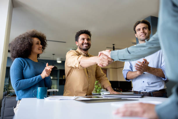 istock Business people handshaking at the office 2148025986