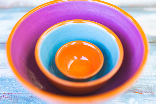 Colorful Majorcan ceramic bowls displayed together. Part of a series.