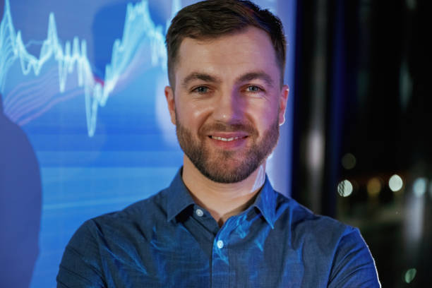 istock Front view, portrait. Business coach against projector with data 2148026380