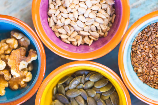 Lively Mallorquin bowls filled with seeds, kernels, and nuts. Part of a series.