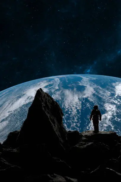 Photo of Astronaut stands on a foreign planets surface, looking towards Earth against a backdrop of stars. 3d render
