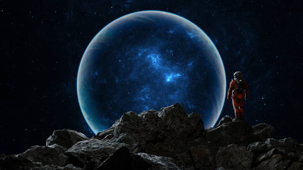 istock Astronaut observes a massive blue planet while perched on a rocky outcrop against the backdrop of a starry sky. 3d render 2148028992