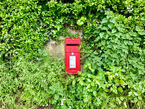 A red British Post Box in Cornwall, England, United Kingdom