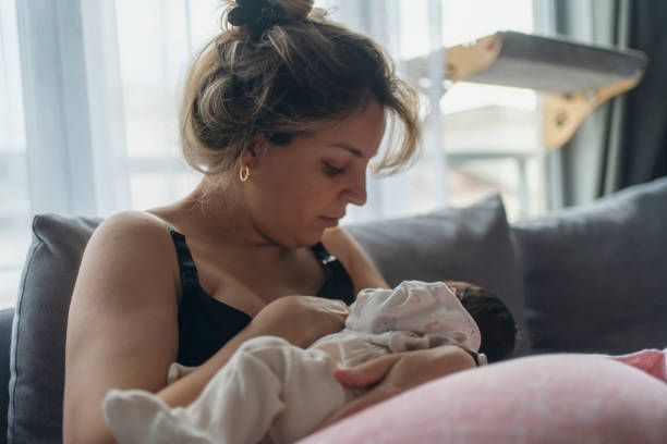 istock Mother breastfeeding her newborn baby 2148030593