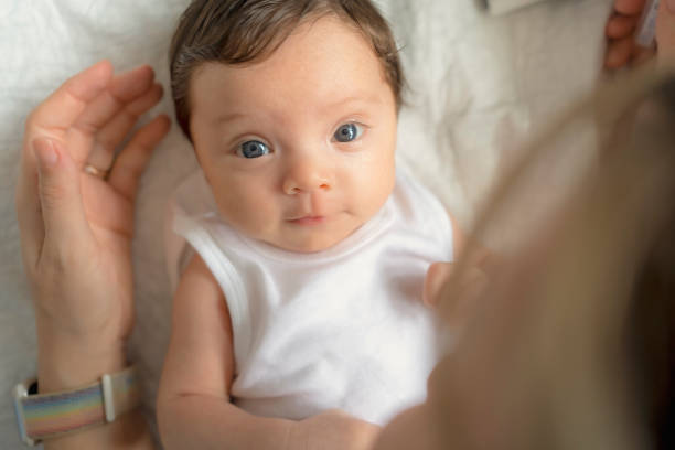 istock Baby making eye contact with his mother 2148030724