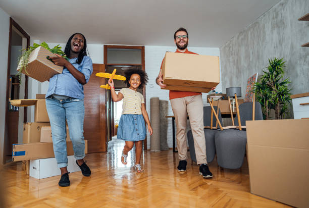istock Multi-ethnic family moving in new home 2148031668