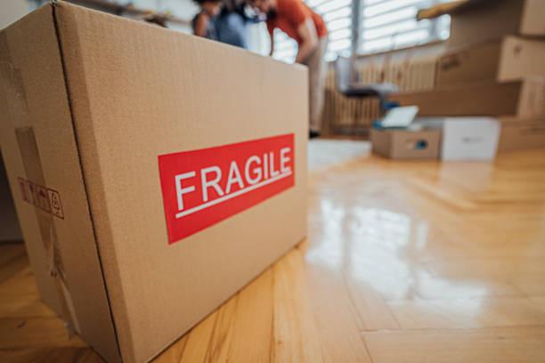 Box labeled fragile in new apartment