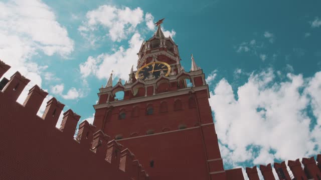 View of Chimes, symbols of the country at the Red Square of Moscow, Russia. Big clock on the tower.