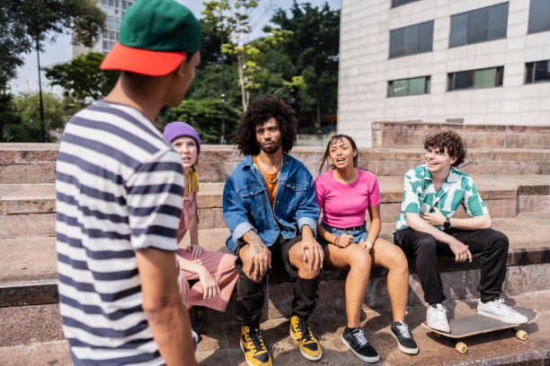 istock Young friends talking outdoors 2148033895