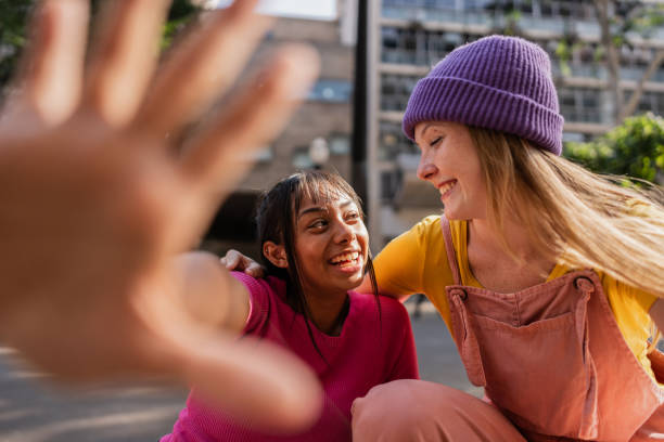 istock Young friends talking outdoors 2148034027