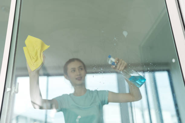istock Beautiful woman cleaning house. 2148034231