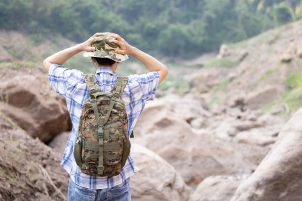 istock Stressed Caucasian man Grabing His head lost in the woods 2148035157